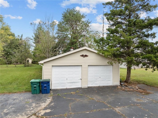 garage with a lawn