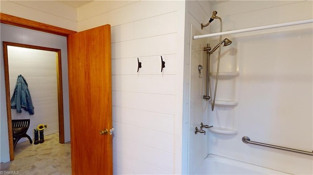 bathroom with shower / bathing tub combination