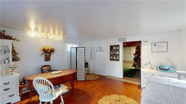 office area with light hardwood / wood-style floors