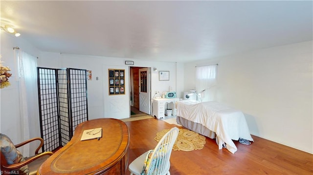 bedroom featuring hardwood / wood-style flooring