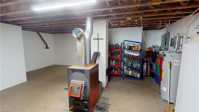 basement with electric panel and gas water heater