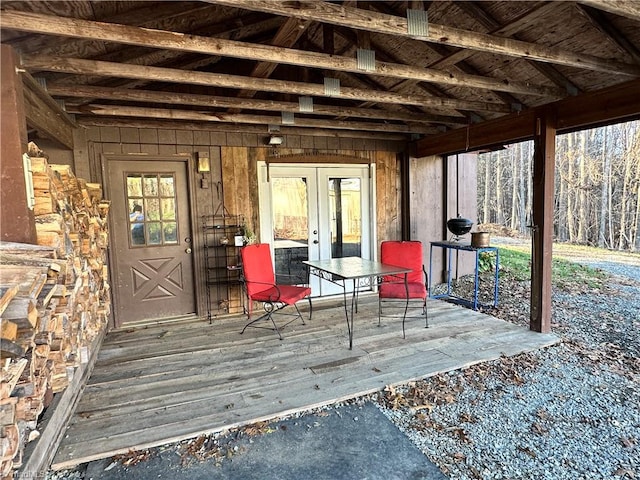 exterior space with french doors and a deck