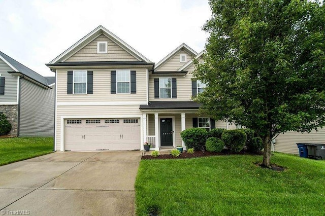 view of front facade with driveway, a front lawn, a garage, and a porch