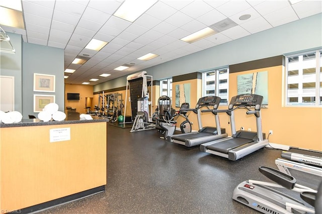 201 N Elm St Unit 310, Greensboro, NC 27401 - gym with a paneled ceiling