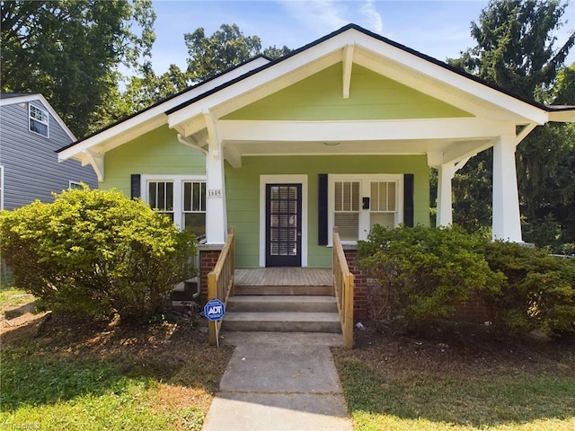 bungalow featuring covered porch