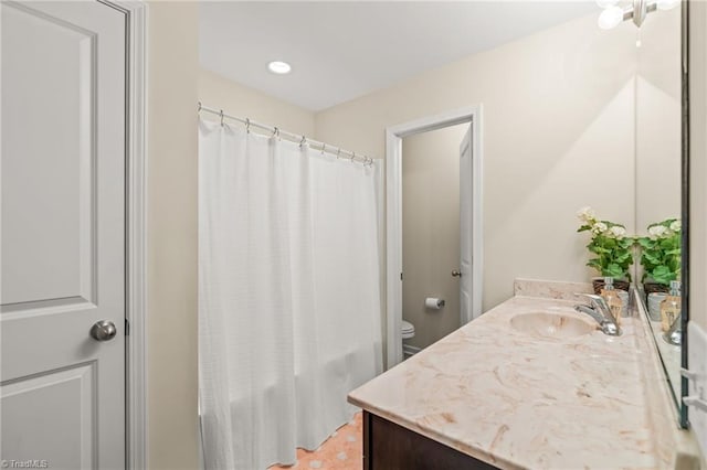 bathroom with toilet, tile patterned flooring, vanity, and a shower with curtain