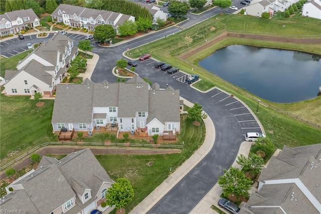 aerial view with a water view and a residential view