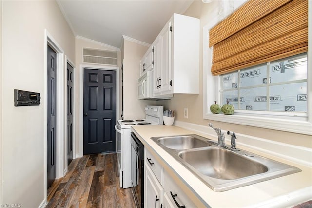 kitchen with white appliances, a sink, ornamental molding, white cabinetry, and dark wood-style floors