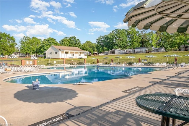 community pool featuring a patio area