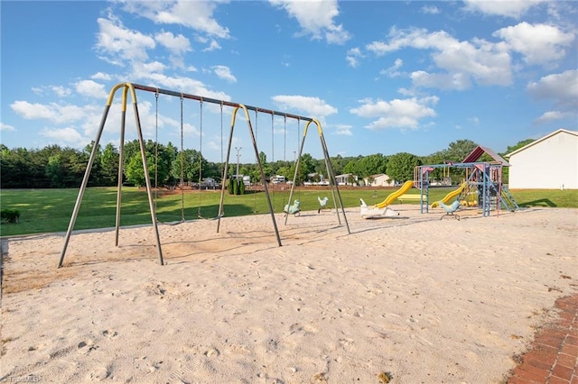community playground featuring a yard