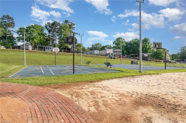 view of sport court with community basketball court and a lawn