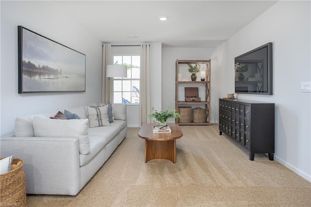 living room with baseboards, carpet flooring, and recessed lighting