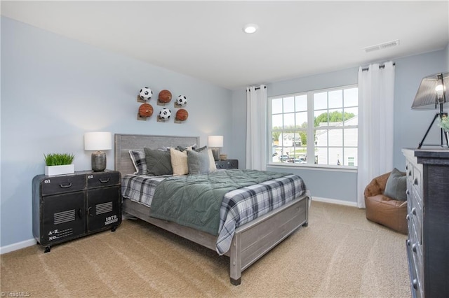 bedroom with recessed lighting, baseboards, visible vents, and light carpet