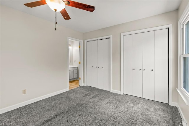 121 Jacklyn Ct, High Point, NC 27265 - unfurnished bedroom with two closets, carpet floors, baseboards, and a ceiling fan