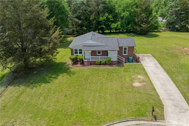 121 Jacklyn Ct, High Point, NC 27265 - view of front of property featuring brick siding, covered porch, concrete driveway, and a front lawn