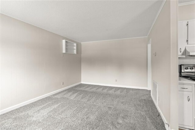 121 Jacklyn Ct, High Point, NC 27265 - empty room featuring carpet flooring, a textured ceiling, baseboards, and crown molding