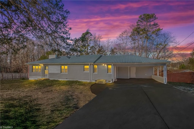 single story home with a carport