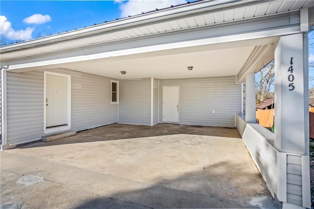 view of patio with a carport