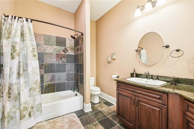 full bathroom with vanity, toilet, and shower / tub combo with curtain