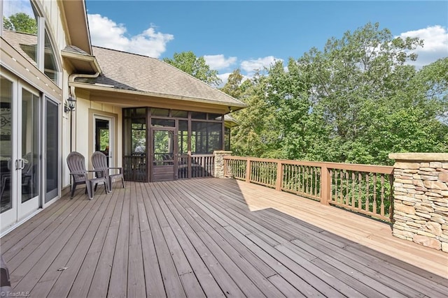 deck featuring a sunroom