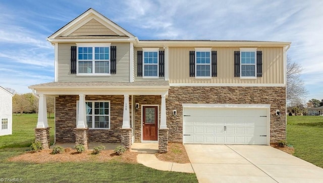 craftsman inspired home with a front yard and a garage