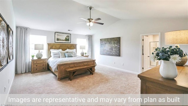 carpeted bedroom with ensuite bath, ceiling fan, lofted ceiling, and multiple windows