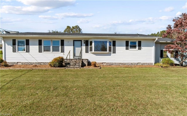 ranch-style house with a front lawn