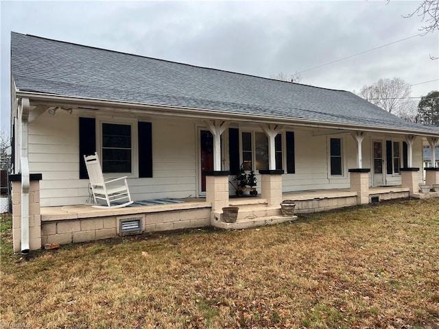 view of front of property with a front lawn and a porch