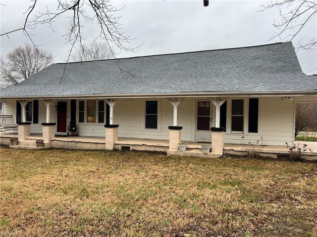 view of front of house featuring a front lawn and a porch