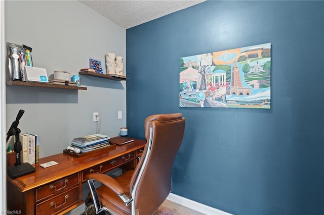 office with a textured ceiling