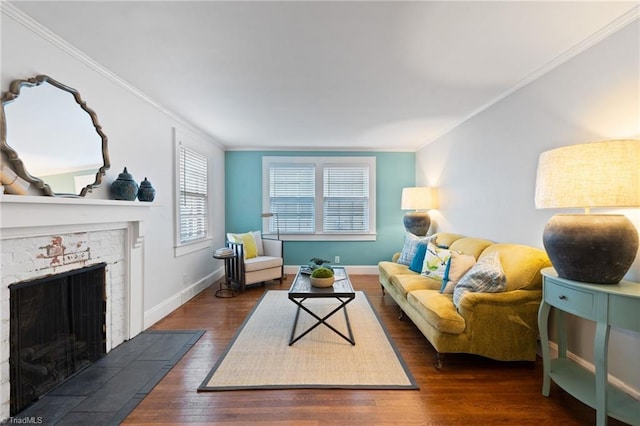 living room with dark wood-type flooring, a brick fireplace, and ornamental molding