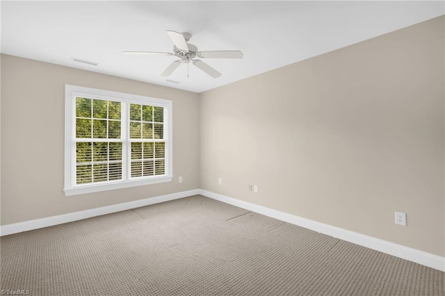 1905 Overshoot Ct, Greensboro, NC 27455 - unfurnished room with carpet and ceiling fan
