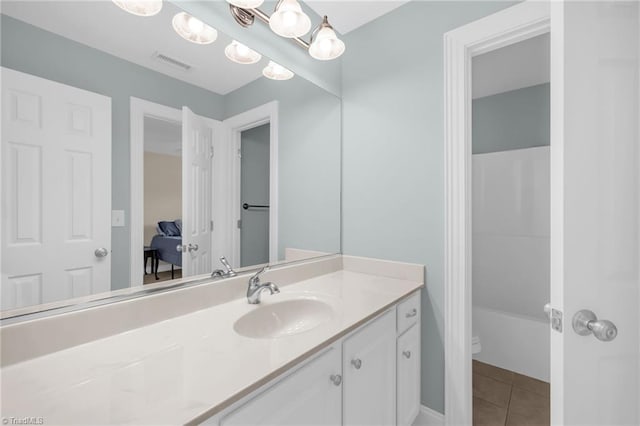 1905 Overshoot Ct, Greensboro, NC 27455 - full bathroom featuring vanity, tile patterned flooring, and bathtub / shower combination