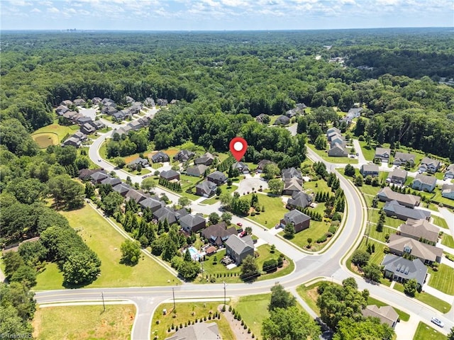 1905 Overshoot Ct, Greensboro, NC 27455 - aerial perspective of suburban area featuring a heavily wooded area