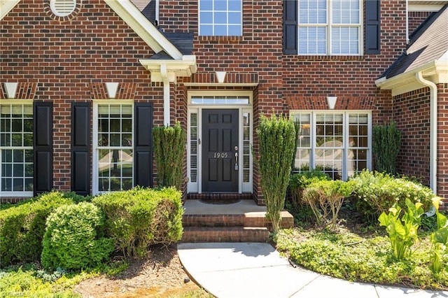 1905 Overshoot Ct, Greensboro, NC 27455 - doorway to property with brick siding