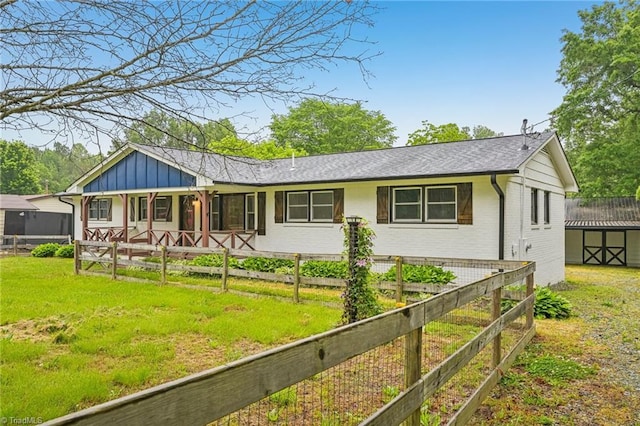 single story home with brick siding and board and batten siding