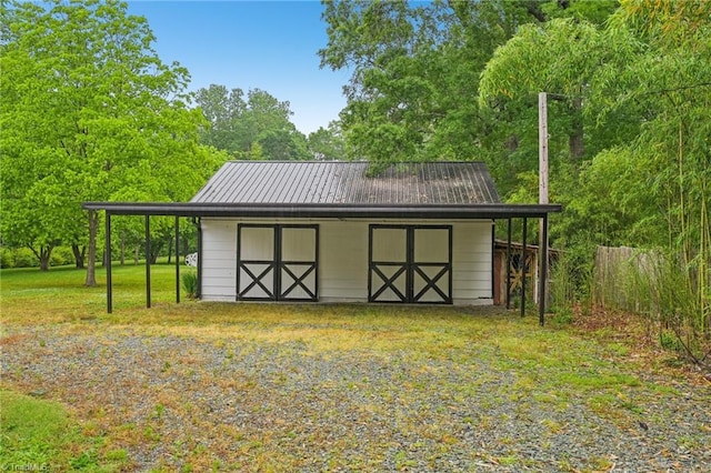 view of outbuilding featuring an outdoor structure