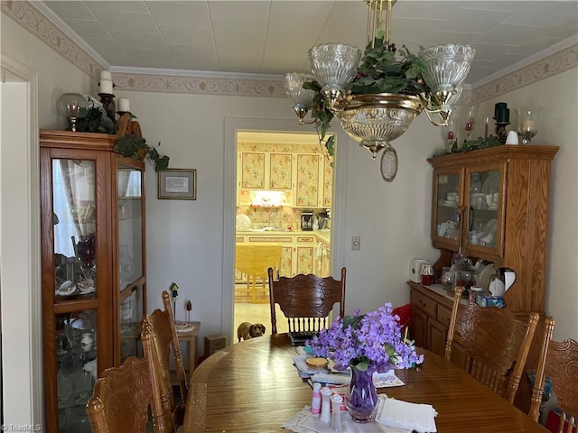 200 Trail Two, Burlington, NC 27215 - dining space with a chandelier and crown molding