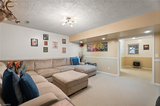 carpeted living room with visible vents, baseboards, a textured ceiling, and heating unit