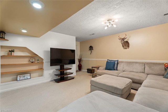 carpeted living area featuring visible vents, a textured ceiling, and baseboards