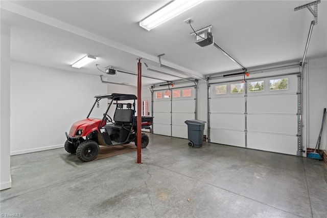 garage featuring a garage door opener