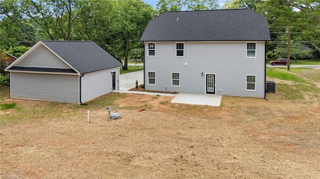 1337 Union Cross Rd, Kernersville, NC 27284 - back of property with a patio, view of wooded area, and roof with shingles