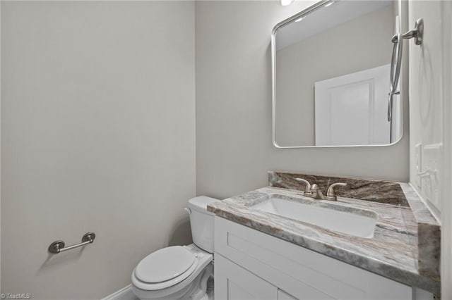 1337 Union Cross Rd, Kernersville, NC 27284 - half bathroom featuring vanity and toilet