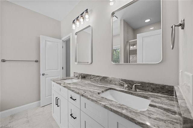 1337 Union Cross Rd, Kernersville, NC 27284 - bathroom featuring a shower stall, double vanity, and marble look tile flooring