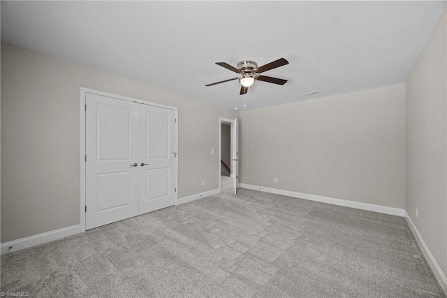 1337 Union Cross Rd, Kernersville, NC 27284 - unfurnished bedroom featuring carpet, a closet, and ceiling fan