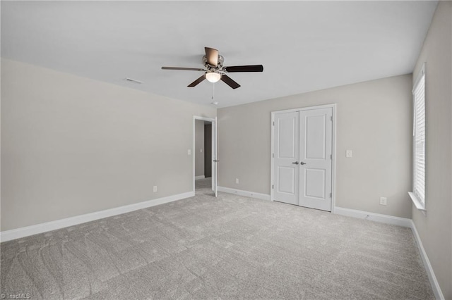 1337 Union Cross Rd, Kernersville, NC 27284 - unfurnished bedroom with carpet flooring, a closet, and ceiling fan