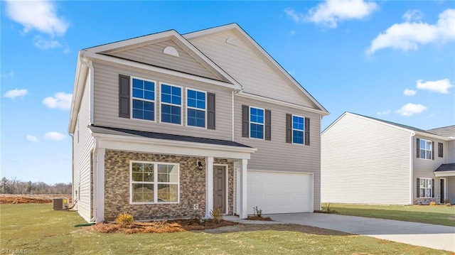 view of front of home with a garage, a front yard, and central air condition unit