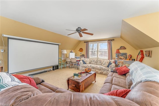 carpeted cinema featuring ceiling fan and lofted ceiling