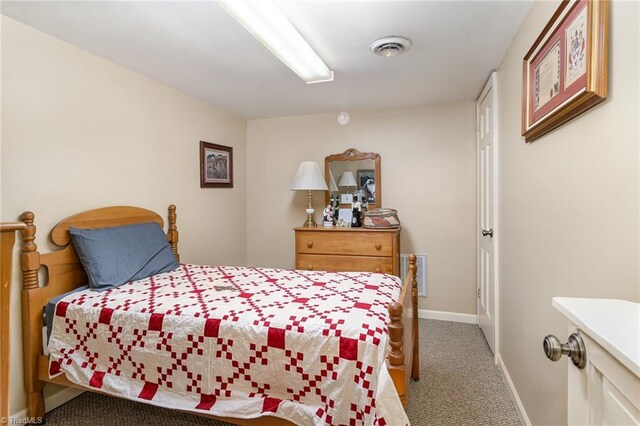 bedroom with light carpet