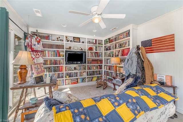 interior space featuring ceiling fan, carpet flooring, and built in shelves